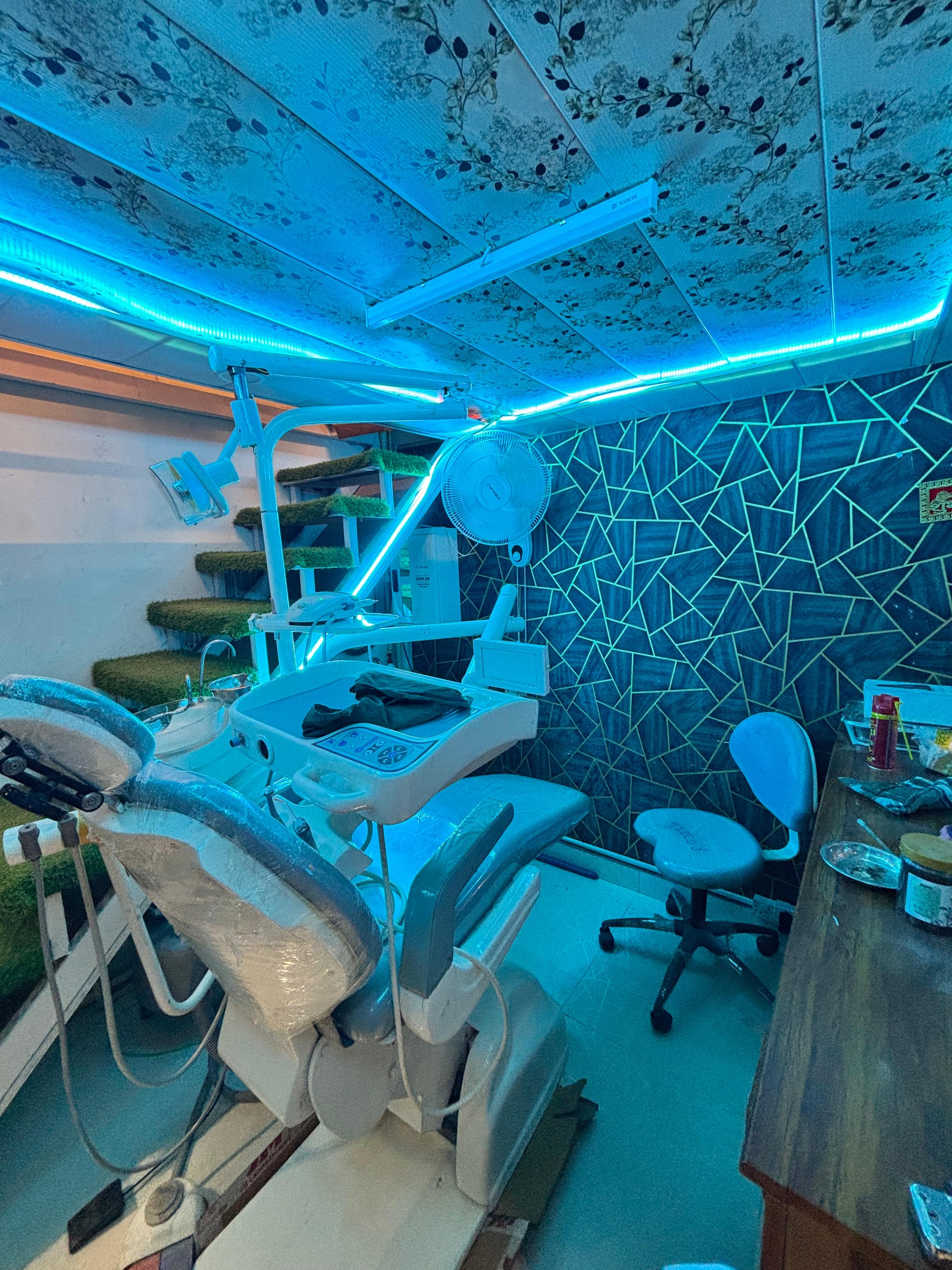 Professional dental chair and certificates displayed at Oromed clinic